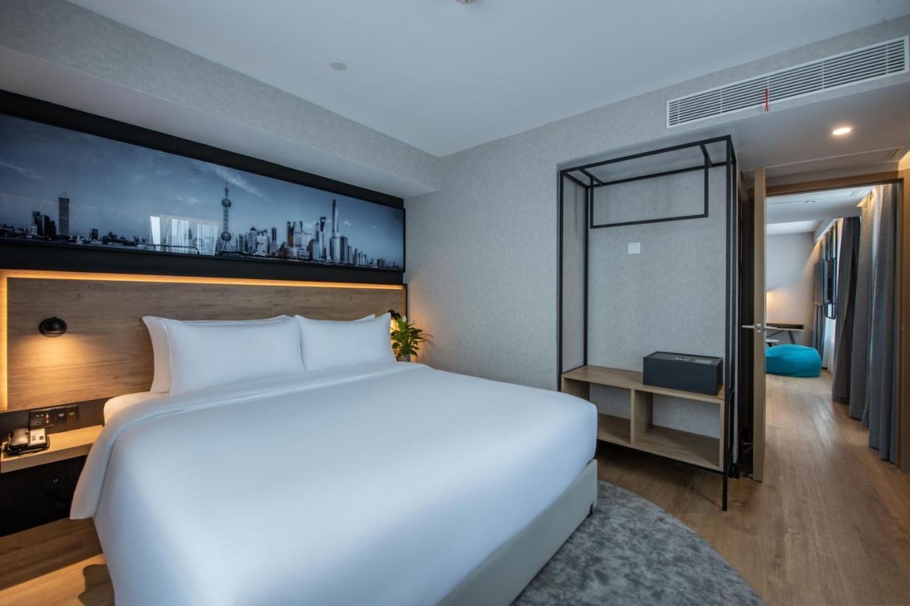 Park Inn By Radisson Shanghai Huanqiugang Exteriör bild