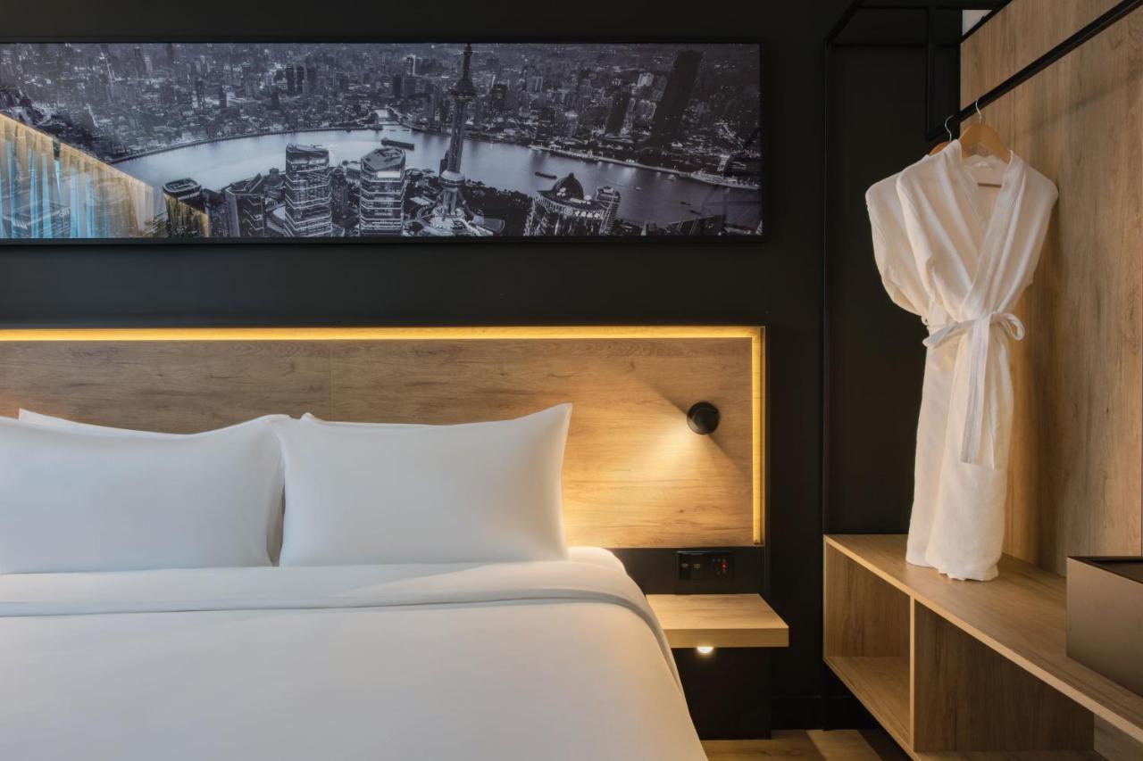 Park Inn By Radisson Shanghai Huanqiugang Exteriör bild