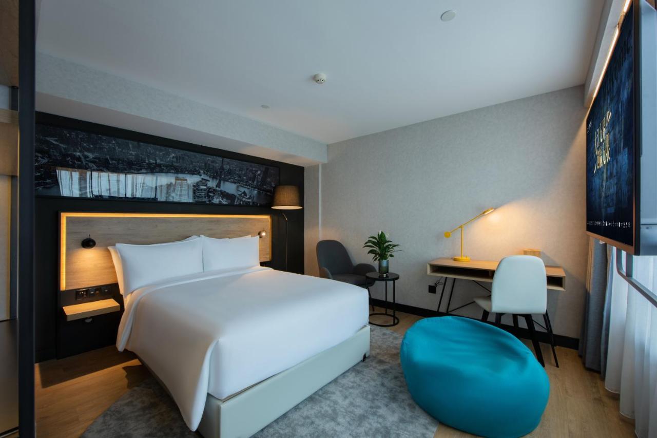 Park Inn By Radisson Shanghai Huanqiugang Exteriör bild