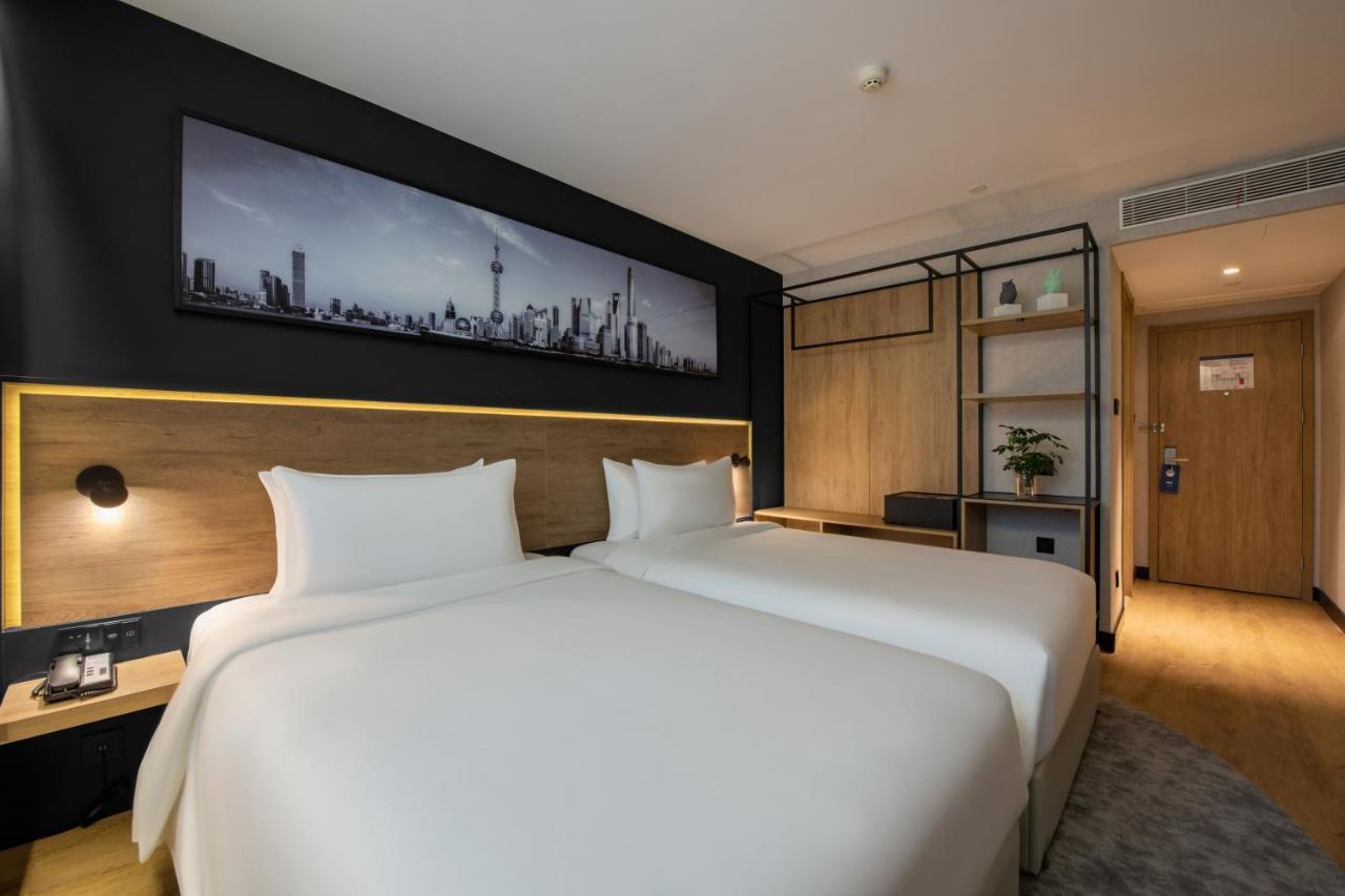 Park Inn By Radisson Shanghai Huanqiugang Exteriör bild