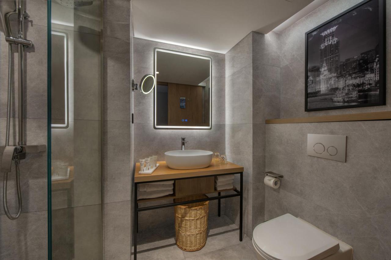 Park Inn By Radisson Shanghai Huanqiugang Exteriör bild