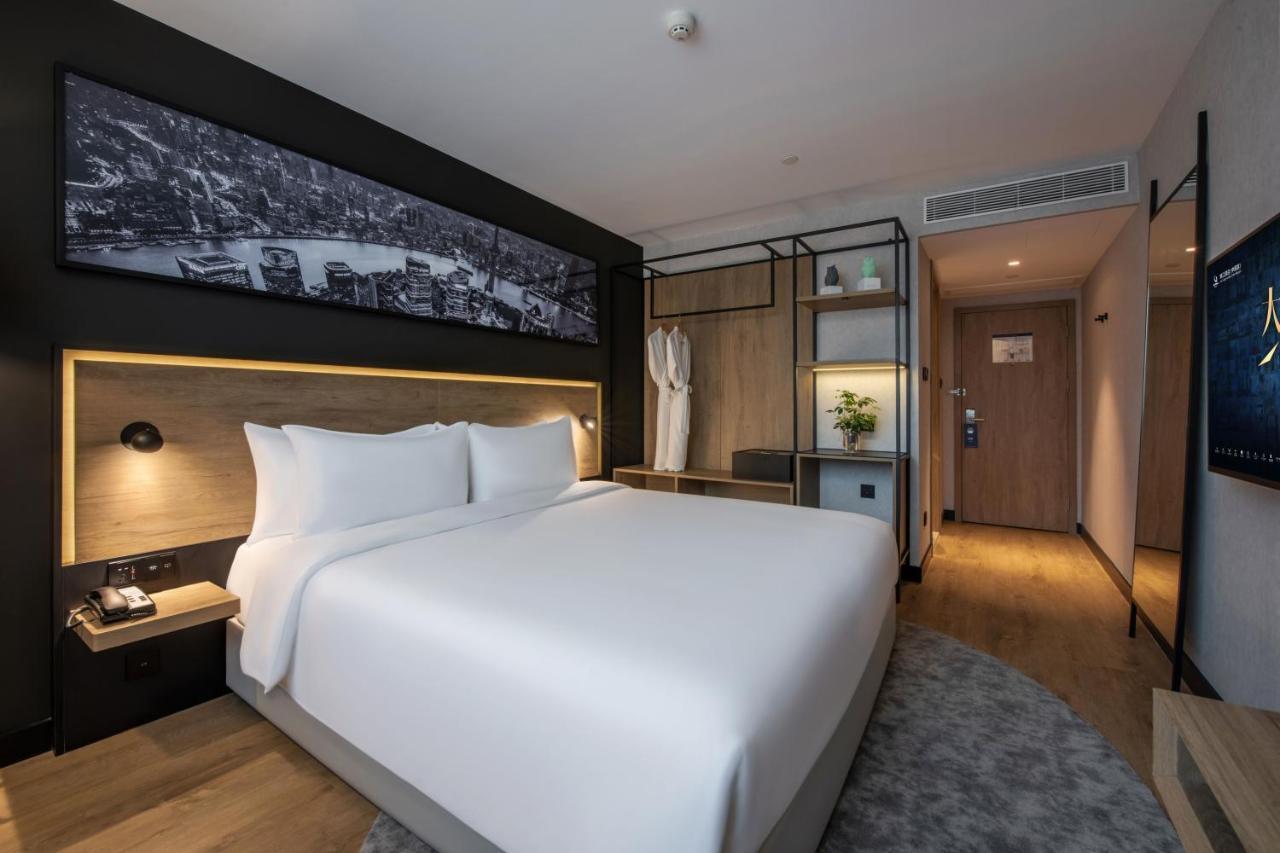 Park Inn By Radisson Shanghai Huanqiugang Exteriör bild